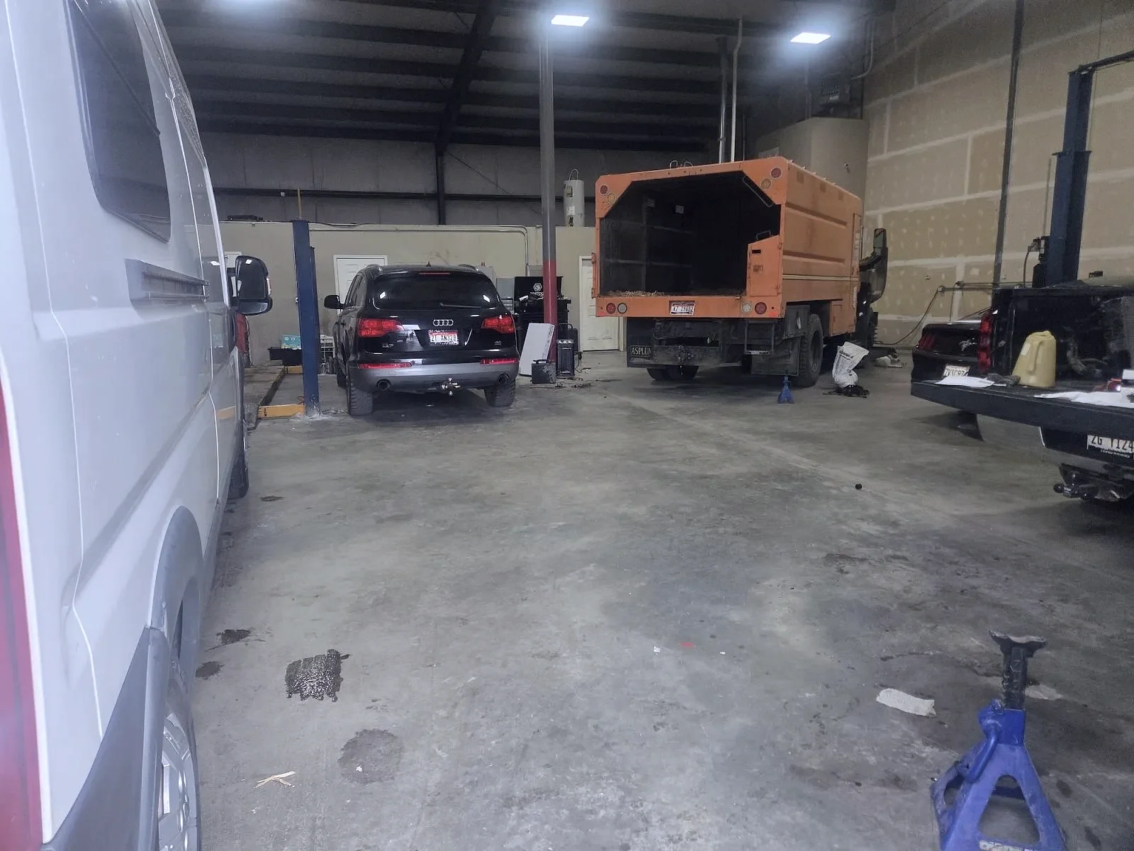Fleet vehicles being serviced at The Automotive Shop in Jerome, Idaho